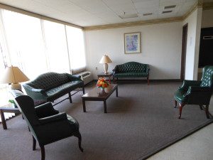 Highlawn Place Interior Green Couches