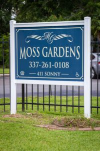 Moss Gardens Apartments sign