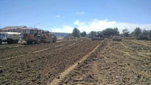 Grading Started with Tractors