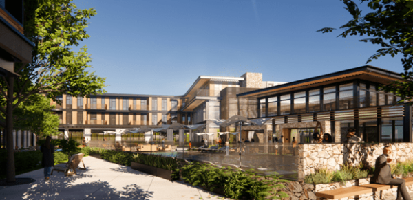 The outdoor courtyard of The Livelle features a modern building with a pool, seating areas, trees, and large windows under a clear blue sky.