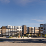 The Livelle is a modern multi-story commercial building complex with a central courtyard, trees, and people walking. The sky above is clear and blue.